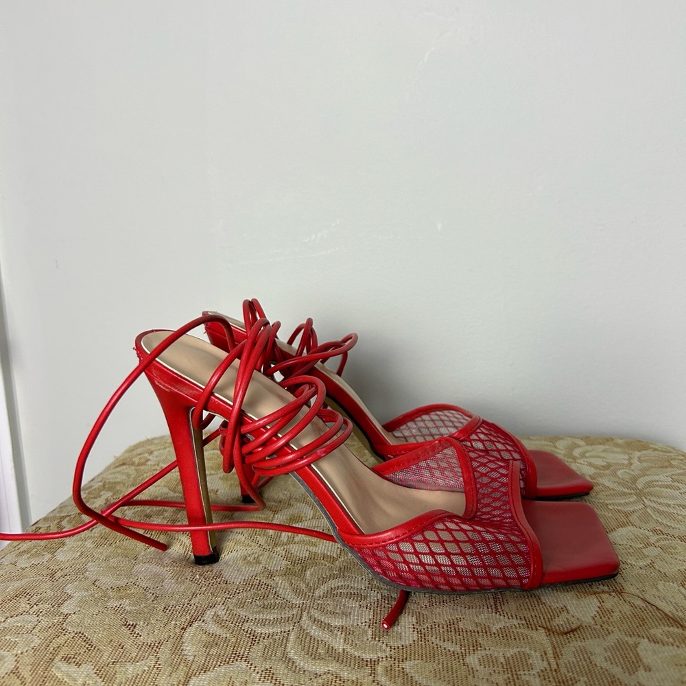 Red mesh open toe stiletto heel.
